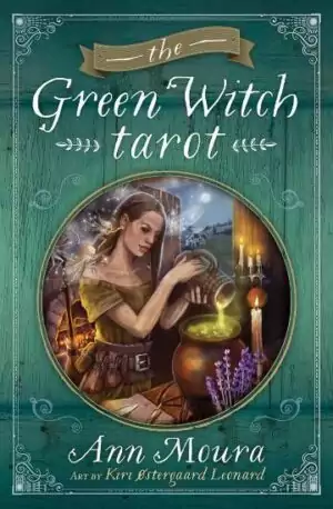 Green Witch Tarot card showing a young woman preparing a potion in a mystical nature-filled setting — lush botanical illustration from Ann Moura's Wiccan deck.