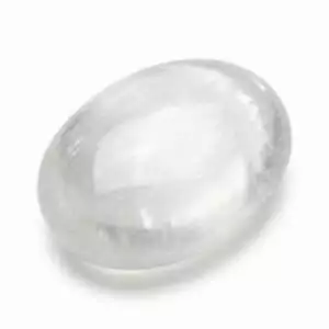 Smooth white selenite palm stone for holding during meditation, reiki, and crown chakra energy work to promote clarity and spiritual alignment.