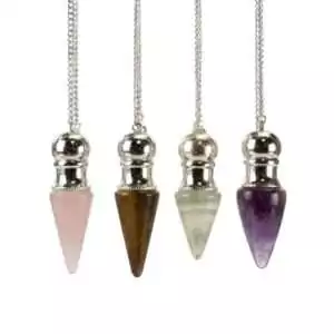 Chambered pendulum with fillable hollow chamber shown open, a crystal dowsing tool that can be filled with herbs, crystals, or oils for customized readings.
