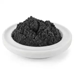 Lodestone black powder incense in a small bowl — fine smooth dark powder used in hoodoo magnetic attraction and drawing rituals.