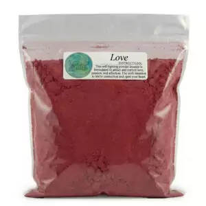 Clear plastic bag of red Love powder incense labeled with description for enhancing love and attraction, ritual use purpose shown on packaging