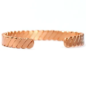 Rose-gold toned woven copper cuff bracelet with twisted design — adjustable open cuff for grounding and balanced energy.