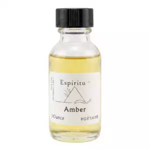 Espiritu Amber ritual aroma oil 1oz labeled glass bottle — warm resinous formula for mental clarity, spiritual awakening, and grounded magical awareness.