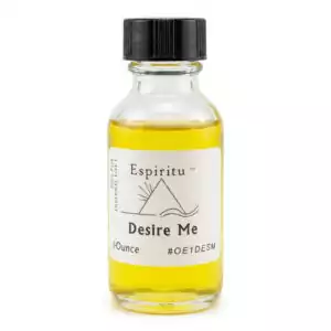A small glass bottle filled with yellow oil labeled Espiritu Desire Me with black cap — a 1oz glamour and attraction ritual fragrance for drawing romantic desire and personal magnetism.