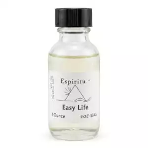 Espiritu Easy Life Ritual Oil 1oz — clear glass bottle with light-colored liquid labeled 'Easy Life' with black cap for abundance, ease, and everyday blessings ritual anointing.