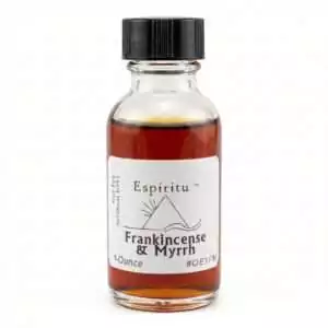 Espiritu Frankincense and Myrrh ritual oil 1 oz — clear glass bottle with label showing the frankincense myrrh anointing oil blend.