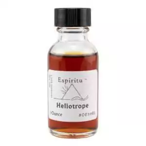 Small glass Espiritu Heliotrope bottle with dark amber liquid and minimalist black cap label — 1oz solar success ritual fragrance oil.