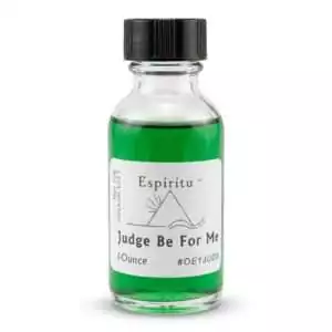 1oz glass bottle of Espiritu Judge Be For Me ritual oil with bright green liquid and black cap — hoodoo fragrance oil for court case and legal victory work.