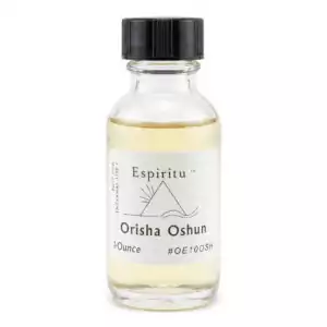 A clear glass bottle containing a light yellow liquid, labeled "Espiritu Orisha Oshun," with a black cap. The label indicates the bottle holds 1 ounce.