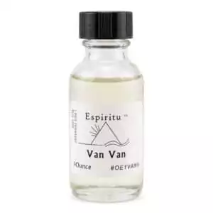 A clear glass bottle of Van Van oil with black cap and white label — an Espiritu 1oz classic New Orleans hoodoo road-opening formula for clearing blocks and reversing bad luck.