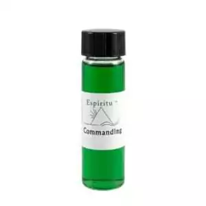 Small 2 dram glass vial of Espiritu Commanding ritual oil with label, a hoodoo power and authority formula for projecting command and respect.