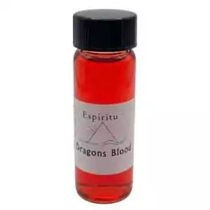 Small 2-dram glass vial of Espiritu Dragon's Blood ritual oil with bright red liquid and black cap — condition oil for power, protection, and spellwork amplification.