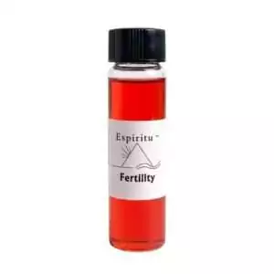 Small 2 dram glass vial of Espiritu Fertility ritual oil with label, for generative power, spring rites, and new-growth manifestation workings.