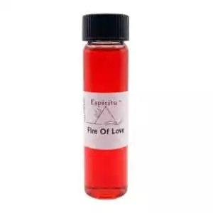 A small glass vial filled with bright red liquid labeled Fire of Love by Espiritu — a 2-dram intense passion ritual fragrance oil for love ignition and romantic attraction spellwork.