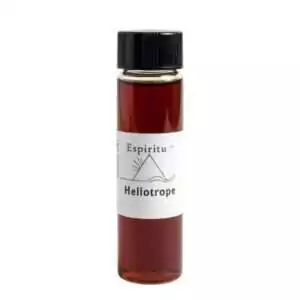 Small 2 dram glass vial of Espiritu Heliotrope ritual aroma oil with label, a solar-aligned floral fragrance for clarity and divination practice.