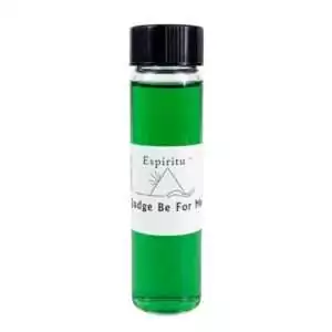 Small 2 dram glass vial of Espiritu Judge Be For Me ritual oil with label and black cap, a hoodoo court-case formula for legal favor.