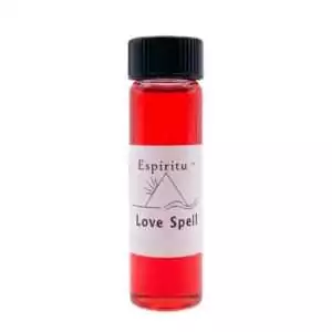 Small 2 dram glass vial of Espiritu Love Spell ritual oil with label and black cap, a sweet romantic fragrance for love-drawing ceremonies.