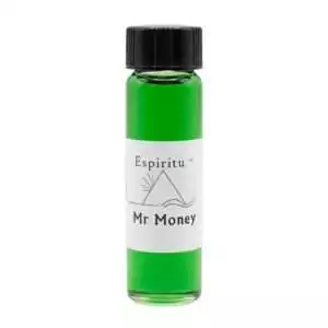 Small 2 dram glass vial of Espiritu Mr Money ritual oil with label, used in hoodoo prosperity and cash-drawing rituals.