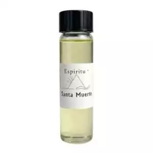 A small glass bottle filled with yellowish liquid labeled Espiritu Santa Muerte with black cap — a 2-dram devotional ritual fragrance oil for Santa Muerte altar and candle work.