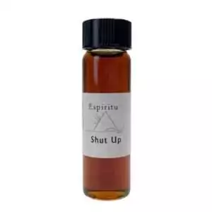 A small glass vial filled with dark amber liquid labeled Espiritu Shut Up — a 2-dram hoodoo conjure fragrance oil for silencing gossip and binding harmful speech in rootwork tradition.