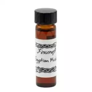 A small amber glass bottle labeled Egyptian Musk containing a Foxcraft ritual fragrance aroma oil — a warm earthy musk for anointing, love rituals, and altar work.