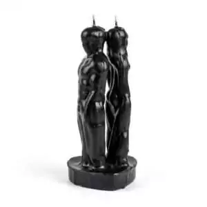 Black dual-figure separation candle showing man and woman forms back to back on a shared base — 6.5-inch hoodoo cord-cutting ritual candle.