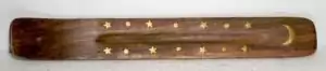 A flat curved wooden incense holder engraved with a crescent moon and stars design — a celestial ash catcher for incense sticks to catch falling ash and protect altar surfaces.