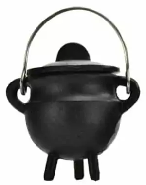 Small black cast iron lidded cauldron with handle resting on three legs — plain finish mini witch's cauldron for resin and petition burning.
