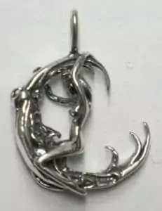 Sterling silver Woman Facing Moon pendant showing a woman silhouette against a crescent moon — a 3/4 inch goddess lunar charm on a plain background.