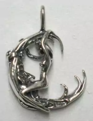 Sterling silver Woman Facing Moon pendant showing a woman silhouette against a crescent moon — a 3/4 inch goddess lunar charm on a plain background.