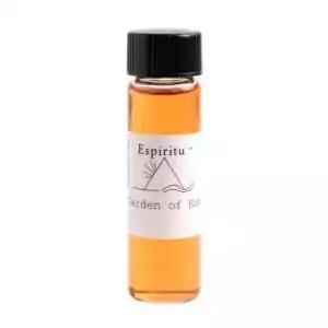 A 2-dram Espiritu Garden of Eden ritual oil bottle with printed label, for sensuality, paradise energy, and anointing in folk magic and ritual practice.