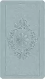 Version 1.0.0 Textured embossed card back design in light blue with central floral motif from the Dreamkeepers Tarot deck.