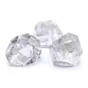 Large clear quartz crystal polygons in geometric form with multiple facets showing natural clarity and crystal inclusions.