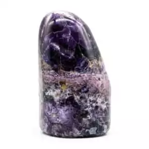 Polished fluorite free shape specimen in violet and purple tones showing natural smooth surface with banding variation.