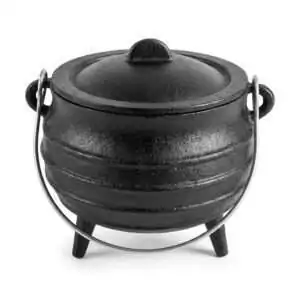 Black 5-inch cast iron cauldron with lid and handle on three legs for burning loose incense smudge herbs charcoal and ritual spell materials on the altar