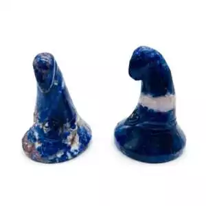 Sodalite witch's hat crystal carvings in deep navy blue and white stone, a set for altar display supporting rational intuition, truth, and third eye clarity.