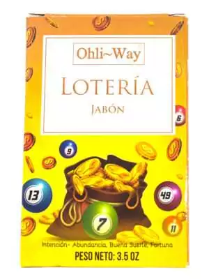 Close-up of Ohli~Way Lottery Soap bar surface — bright golden-yellow color suggesting prosperity and luck.