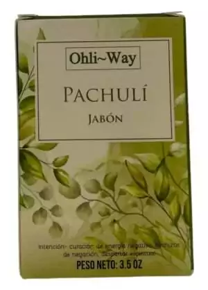 Close-up of Ohli~Way Patchouli ritual soap bar surface showing dark brown earthy color and handcrafted texture.