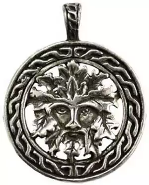 Celtic Greenman Amulet showing foliate face of leaves and vines representing vegetation god and nature spirit talisman for earth connection growth and wild nature ritual