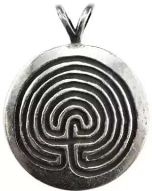 Silver pewter circular labyrinth pendant with intricate concentric lines and a loop at the top for wearing on a cord.