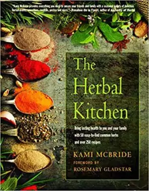 Herbal Kitchen book by McBride and Gladstar showing cover with herb imagery, guide to cooking with medicinal herbs bridging culinary herbalism and plant lore