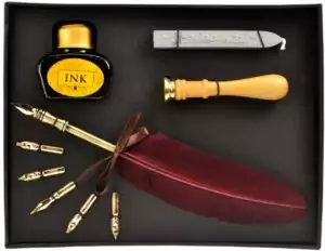 Ritual calligraphic set by Lo Scarabeo showing quill pen, ink bottle, and wax seal stamp arranged for magical writing and parchment spellwork