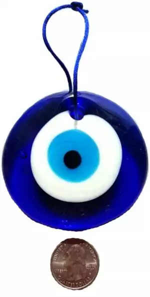 Three-inch handblown glass evil eye nazar wall hanging in traditional blue and white concentric eye design for protective home display
