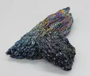 3 lb flat carborundum silicon carbide piece showing iridescent rainbow metallic surface — striking light spectrum altar display mineral.
