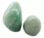 Polished amazonite free shape showing smooth teal-green stone surface with white veining and organic natural form — calming crystal display piece.