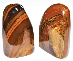 Natural tiger eye free shape raw specimen approximately 0.4 lb with golden chatoyant silky banded luster on white background