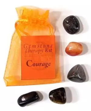 Courage gemstone therapy crystal kit showing assortment of stones selected for bravery confidence and bold action in meditation and ritual use
