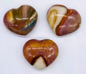 1.25-inch polychrome jasper heart showing swirling earth tones of red orange brown and cream — desert jasper pocket heart stone.