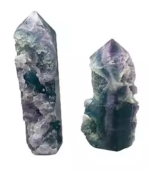 Medium 1.2-1.7 lb fluorite natural obelisk tower showing one polished face with green and purple crystal banding.