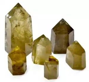 One pound bulk lot of small golden rutilated quartz obelisks ranging 0.5 to 2 inches, showing clear quartz with golden needle-like rutile inclusions in mini tower forms.
